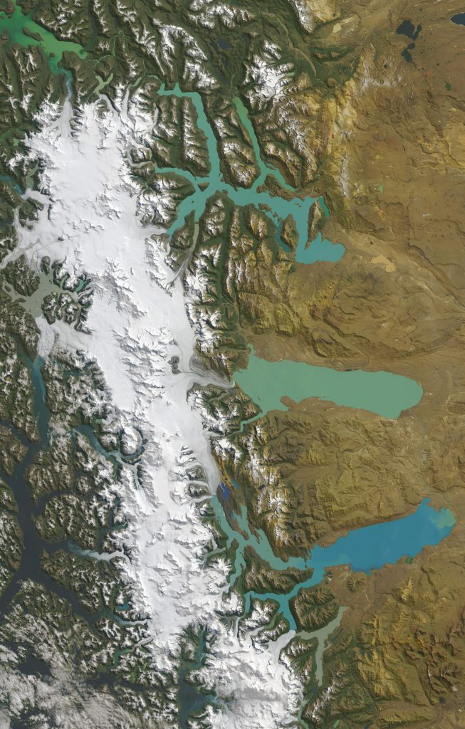 Jay Hart&nbsp;• <em>South Patagonia Icefield</em>&nbsp;• Inkjet print of Landsat imagery&nbsp;• 24″×&nbsp;38″&nbsp;• $350.00<div class="fb-text&quot><p style="margin-top:5px; text-align:center; font-size: 0.8em; ">As the Andes extend southward into the core of the temperate zone, cold and wet become the year-round rule: a perhumid climate is dominant. At the crest of the range snowfall is a very normal happenstance, and two icefields have developed: North Patagonia and South Patagonia, the latter being larger and likely to be longer lasting. The glacial troughs on the right side show amazing scars of overdeepening. As a mild-mannered surrogate to the perhumid Tall Coast region, this ice factory will likely be a laggard to drastic changes in more extreme environments (the Arctic has recently had more temperature rise than other regions). </p></div>