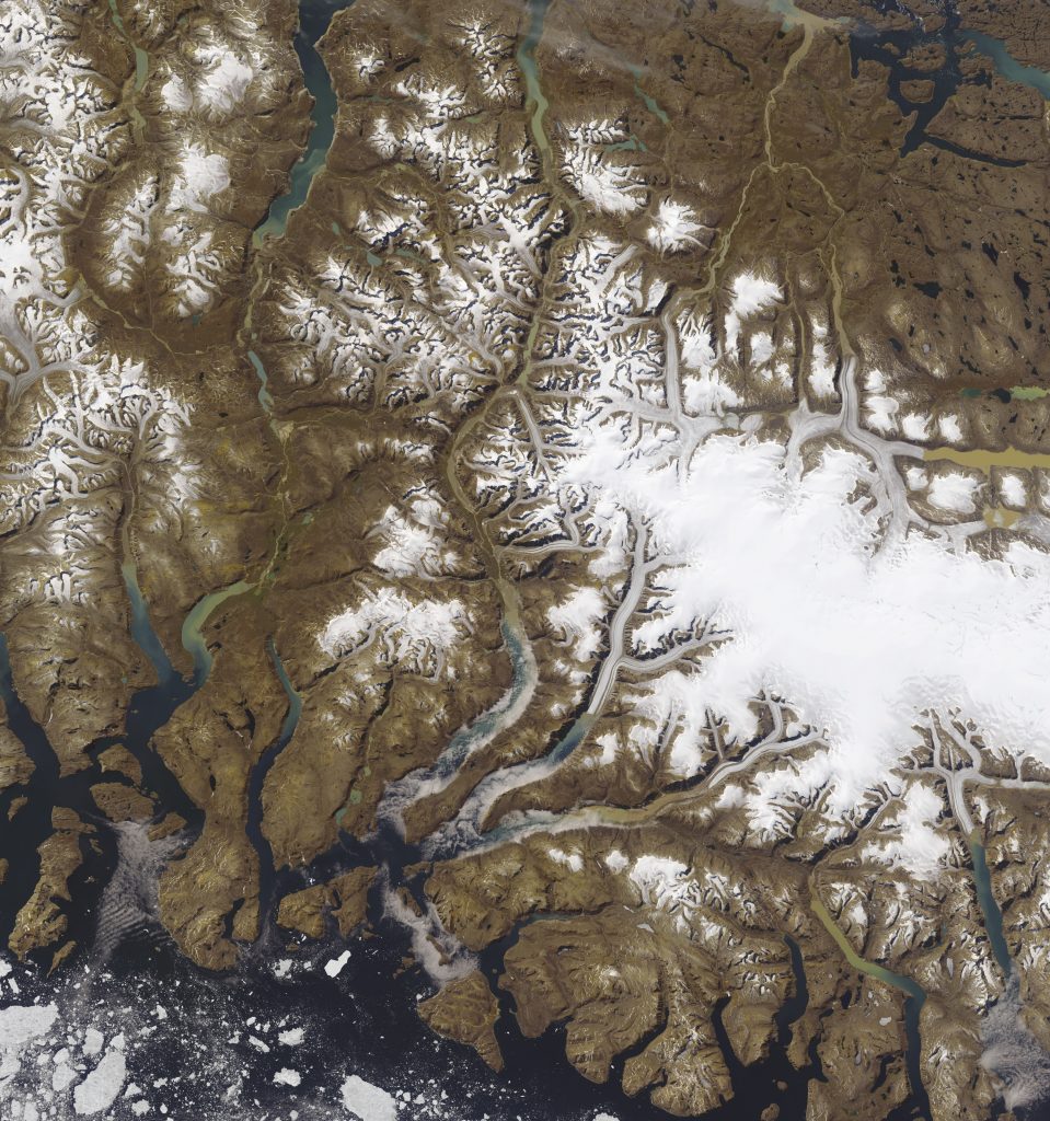 Jay Hart&nbsp;• <em>East Baffin Ranges with Penny Icecap</em>&nbsp;• Inkjet print of Landsat imagery&nbsp;• 39″×&nbsp;42″&nbsp;• $550.00<div class="fb-text&quot><p style="margin-top:5px; text-align:center; font-size: 0.8em; ">Here is located Canada's most famed Northern national park, Auyuittuq. Unique landscapes fill the eye with improbable combinations of bare rock slopes and gentle vales. If the world needs a lab to figure out how glaciers carve mountains, there is a good one here. More than a hundred troughs are edged by cirques in their final stages of meltout, leaving horns and knife-ridges of amazing diversity. Through-valleys mark the placement of the main avenues of ice escape, while the remnant Penny dome asks the curious what marvels await its further retreat. The area is a model for what will be found in the mountainous parts of Antarctica's buried topography. </p></div>
