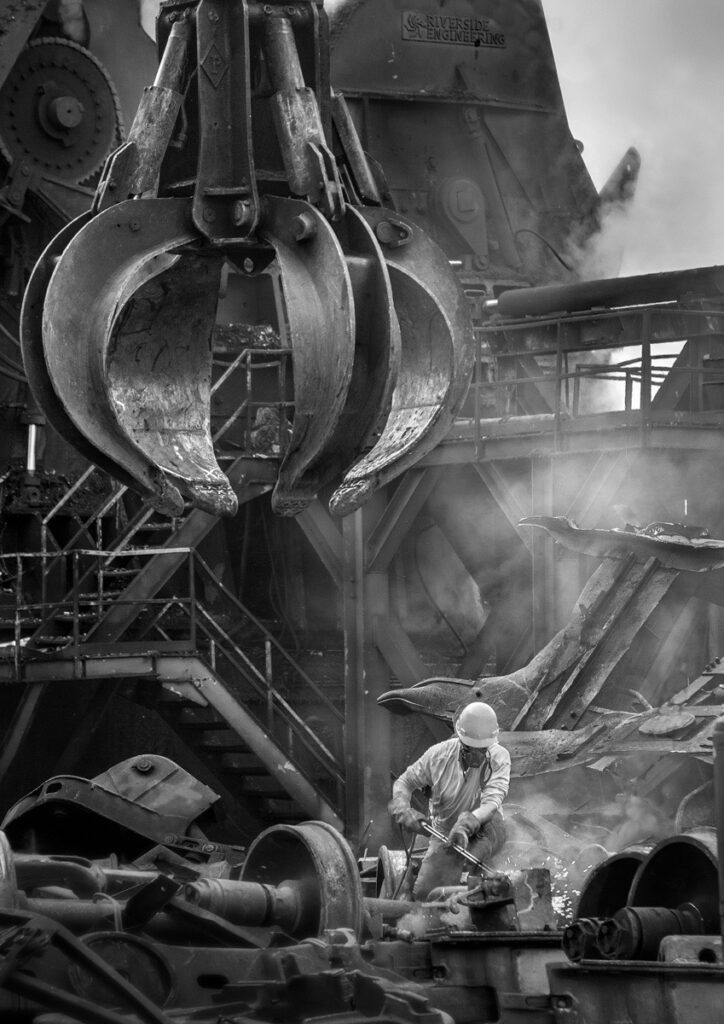 <span class="award_name">First Prize</span>Ray Helmke&nbsp;• <em>Scrap Metal Worker</em>&nbsp;• Archival ink-jet print&nbsp;• $200.00
