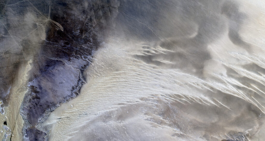 Jay Hart&nbsp;• <em>Sugary Dunes in Eastern Libya</em>&nbsp;• Natural color Landsat over shaded elevation&nbsp;• 80″×&nbsp;43″&nbsp;• $1,250.00