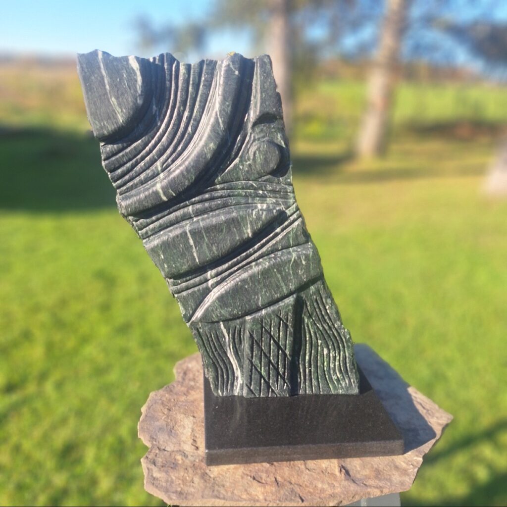 Jason Rivard&nbsp;• <em>Hear On Earth</em>&nbsp;• Vermont verde serpentine&nbsp;• 10½″×&nbsp;21″&nbsp;• $1,200.00