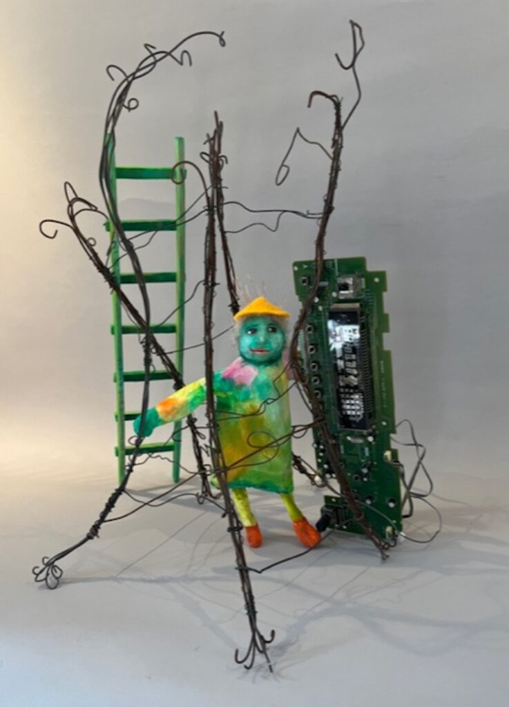 Jane Dennis&nbsp;• <em>Wireless Media Trap</em>&nbsp;• Mixed media&nbsp;• 16″×&nbsp;16″×&nbsp;12″&nbsp;• POR