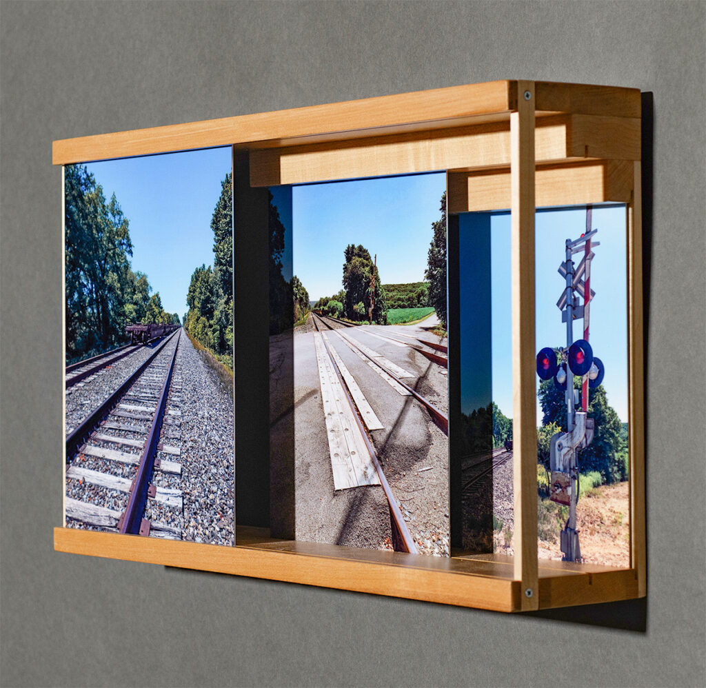 Eva M. Capobianco&nbsp;• <em>Map 4 - Crossing the Tracks</em>&nbsp;• Photos on metal, reused wood&nbsp;• 12″×&nbsp;20″×&nbsp;4″&nbsp;• $525.00