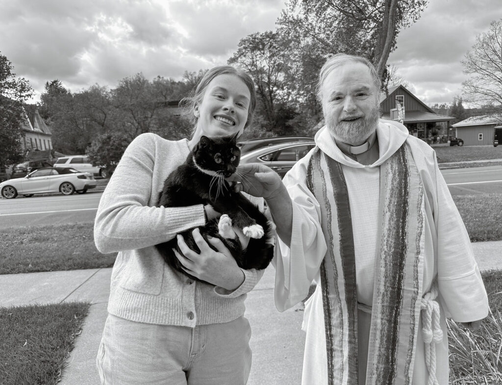 Susan C. Larkin&nbsp;• <em>Emily Fanelli, Dusty, Fr. Ed Murphy</em>&nbsp;• Archival digital print&nbsp;• 24″×&nbsp;20″&nbsp;• $300.00