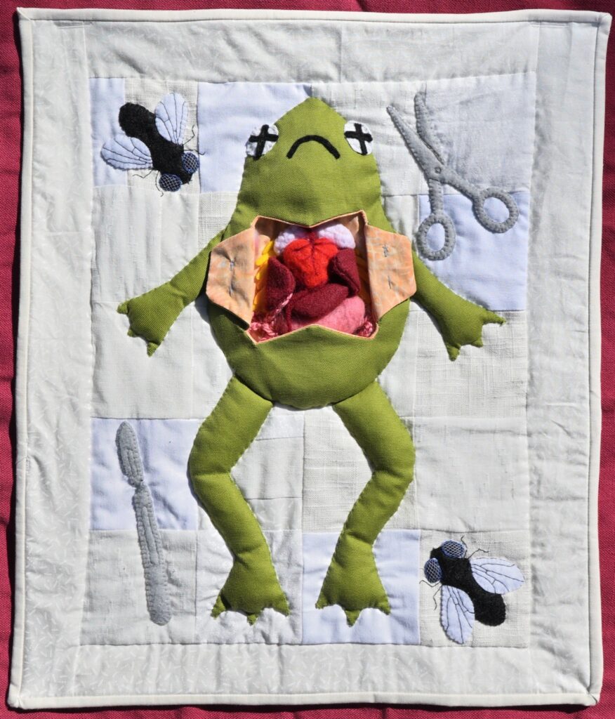 Gianna Mercier&nbsp;• <em>Wide Open</em>&nbsp;• Quilting cotton and synthetic woven fabric, acrylic yarn and felt, wool roving&nbsp;• 17″×&nbsp;20″&nbsp;• NFS
