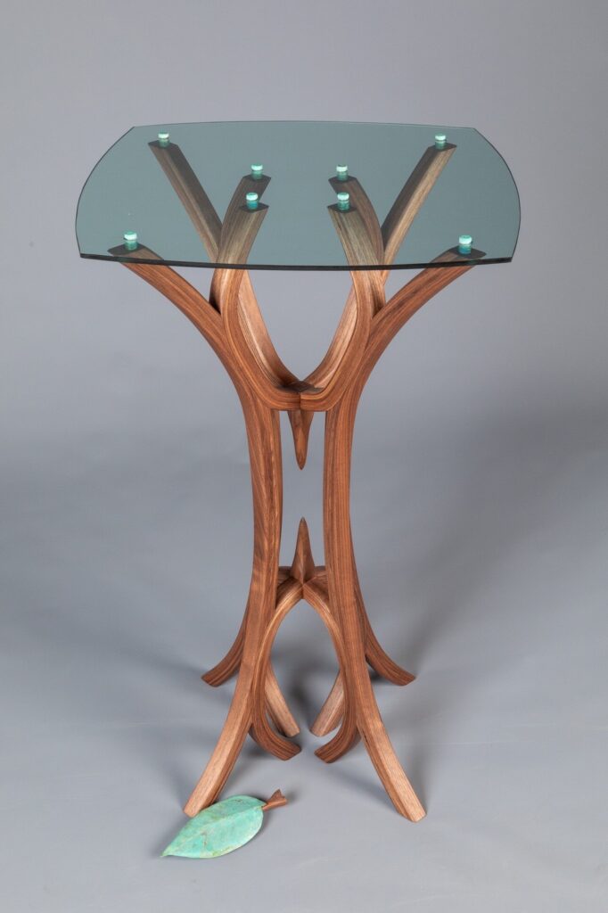 Sean Mullin&nbsp;• <em>Renewal</em>&nbsp;• Walnut, brass, glass&nbsp;• 19″×&nbsp;19″×&nbsp;31½″&nbsp;• NFS