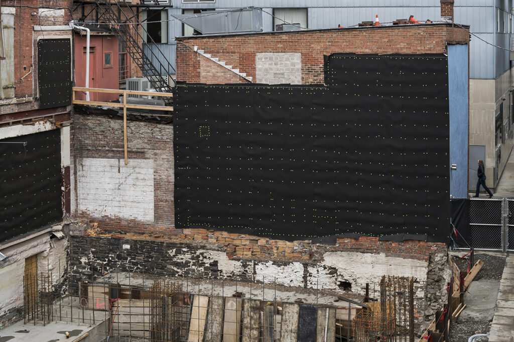 Harry Littell&nbsp;• <em>Harold's Square, Ithaca 2018</em>&nbsp;• Archival digital print&nbsp;• 28″×&nbsp;21″&nbsp;• $475.00<a class="purchase" href="https://state-of-the-art-gallery.square.site/product/harry-littell-harold-s-square-ithaca-2018/TMVZUKLQKUWVKBNOZMCBKPKN" target="_blank">Buy</a>