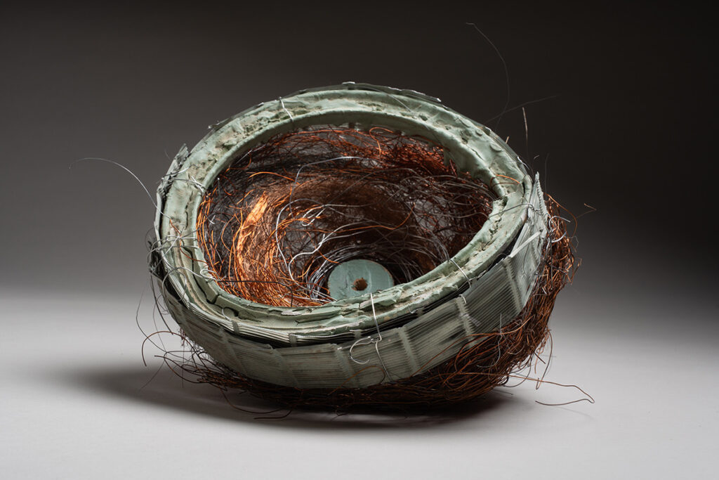 Ann Reichlin&nbsp;• <em>House Geode H</em>&nbsp;• Paint can, copper wire, house paint, house debris&nbsp;• 7½″×&nbsp;7½″&nbsp;• $1,000.00<a class="purchase" href="https://state-of-the-art-gallery.square.site/product/ann-reichlin-house-geode-h/AQUL4TUOMCOKZG5L77CVJEIC" target="_blank">Buy</a>